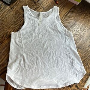 Lululemon sculpt tank size 6. New condition.